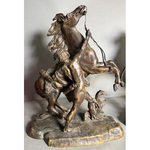 244 - Two late 19th Century classical Marley horse figural groups of rearing horses and semi clad figures ... 