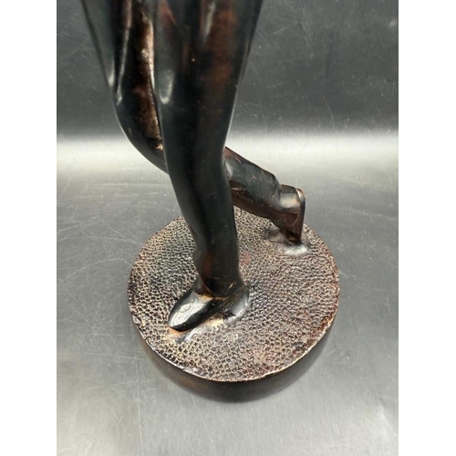 249 - A cast iron bronzed figure of a lady golfer H31cm