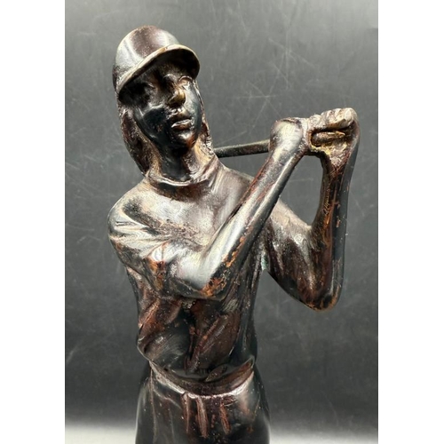 249 - A cast iron bronzed figure of a lady golfer H31cm