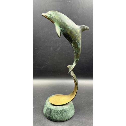 252 - A bronze sculpture of a dolphin on a marble base