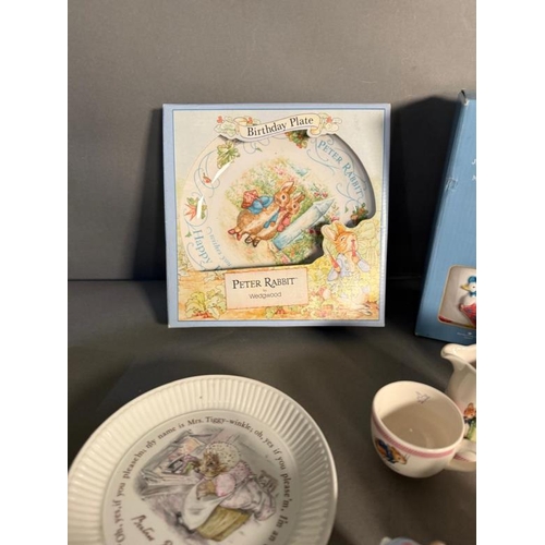 273 - A quantity of Wedgwood Beatrix Potter ceramics to include plates, cups, saucers and figurines