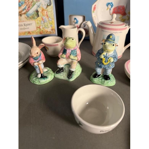 273 - A quantity of Wedgwood Beatrix Potter ceramics to include plates, cups, saucers and figurines