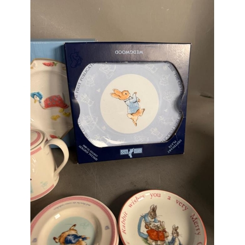 273 - A quantity of Wedgwood Beatrix Potter ceramics to include plates, cups, saucers and figurines