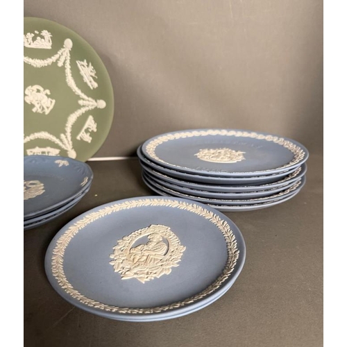 276 - A selection of Wedgwood Jasperware to include Christmas plates, miniature tea pots and pin dishes