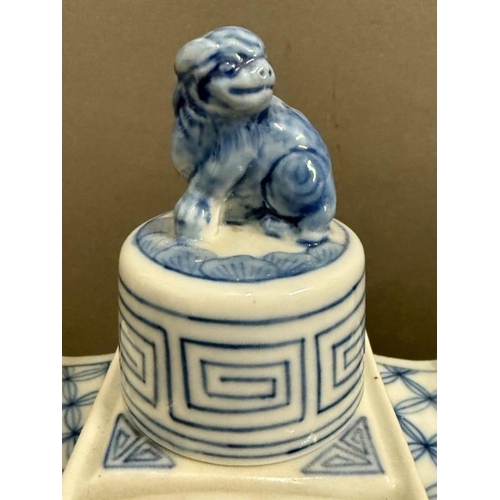 280 - Two ceramic Chinese blue and white tea caddies with foo dogs to lids