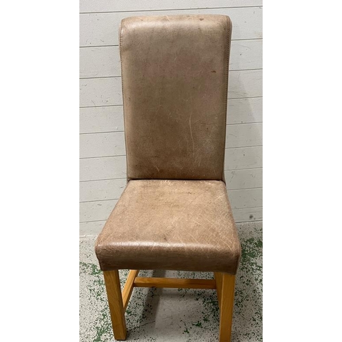 30 - Two dining tan leather chairs