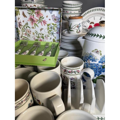 308 - A large quantity of Portmeirion pottery to include dishes, a clock and mugs