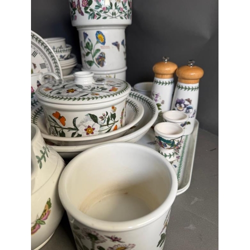 308 - A large quantity of Portmeirion pottery to include dishes, a clock and mugs