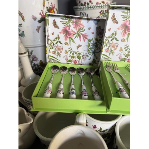 308 - A large quantity of Portmeirion pottery to include dishes, a clock and mugs