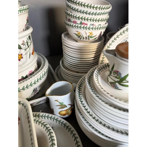 308 - A large quantity of Portmeirion pottery to include dishes, a clock and mugs