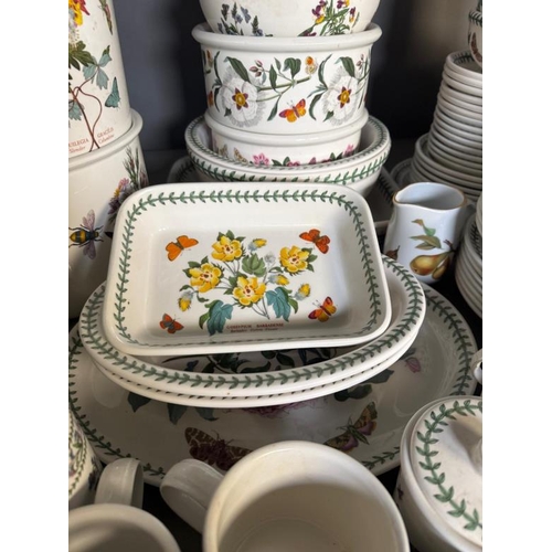 308 - A large quantity of Portmeirion pottery to include dishes, a clock and mugs