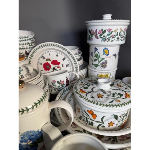 308 - A large quantity of Portmeirion pottery to include dishes, a clock and mugs