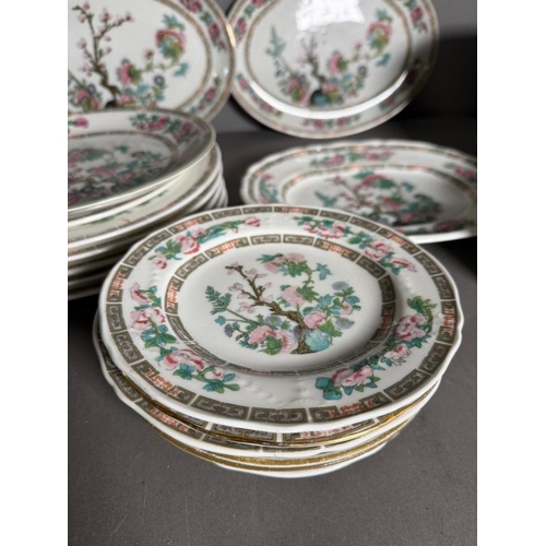 313 - A quantity of Indian tree pattern ceramic dinnerware various makers to include Minton and Myott Son ... 