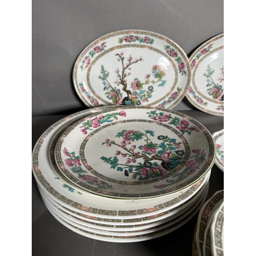 313 - A quantity of Indian tree pattern ceramic dinnerware various makers to include Minton and Myott Son ... 