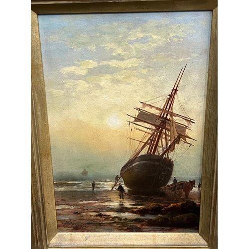 354 - Nautical scene of a ship at low tide with workers, oil on panel signed lower left