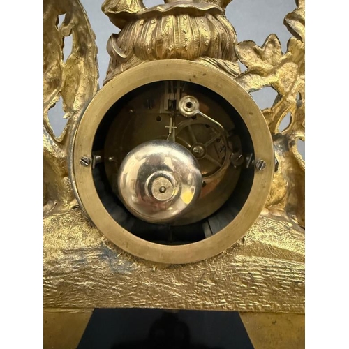 374 - A 19th Century French gilt mantel clock in a glass dome and on plinth, an eight day movement with en... 