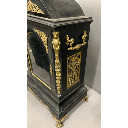 384 - A large Victorian bracket clock case, ebony and brass ormolu mounts (H63cm W39cm)