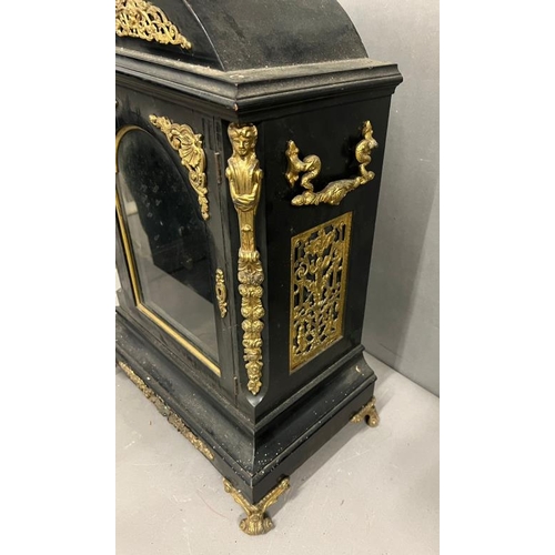 384 - A large Victorian bracket clock case, ebony and brass ormolu mounts (H63cm W39cm)