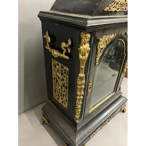 384 - A large Victorian bracket clock case, ebony and brass ormolu mounts (H63cm W39cm)