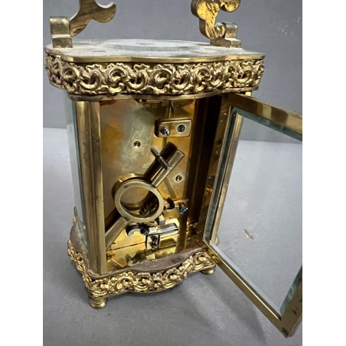 392 - Eight day carriage clock, eight day movement with lever platform scrolling fretwork to top and botto... 