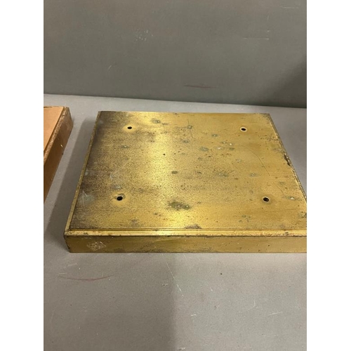 414 - Two bronze/brass platform or plinths (H4cm W29cm D25cm)