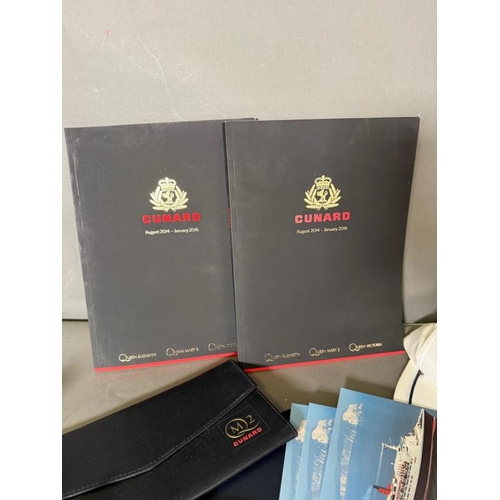 435G - A large quantity of Cunard line collectables to include QE2 brochures caps and stationary and a Wedg... 