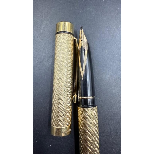 439 - A vintage gold plated Sheafter fountain pen and matching ball point