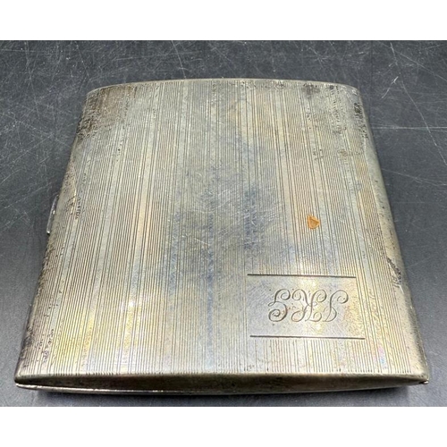 451 - A silver cigarette case by William Neale & Son Ltd, hallmarked for Birmingham 1927