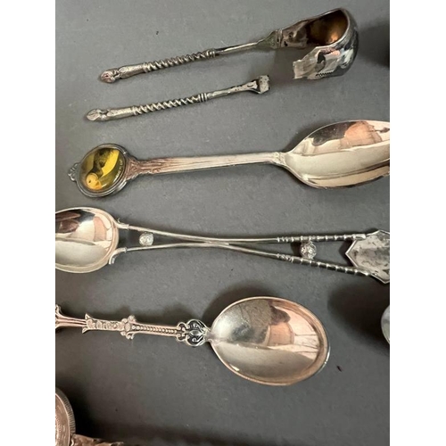 454 - A selection of collectable spoons, some silver