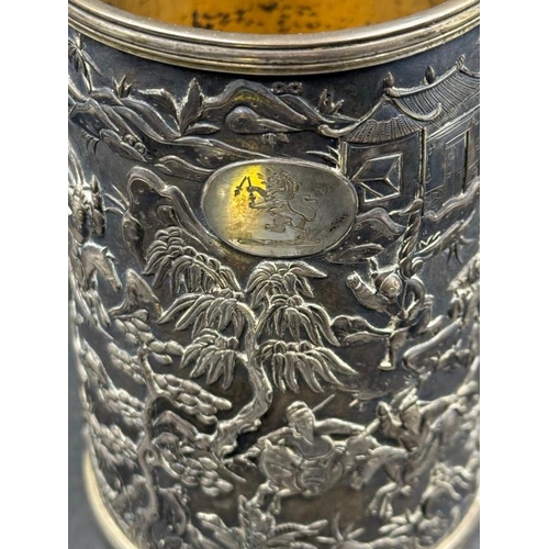 456 - A 19th Century silver Chinese Export Beer tankard with dragon handle and warrior themed engraving, h... 