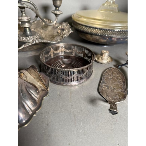 478 - A quantity of silver plate and white metal items to include serving dish, kettle and a candelabra