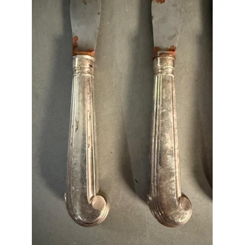 487 - A set of Victorian silver handled pistol gripped knives retailed by Garrad. Handles hallmarked for L... 