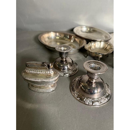 490 - A quantity of silver plate and white metal items to include pin dishes, footed bowls and candlestick... 