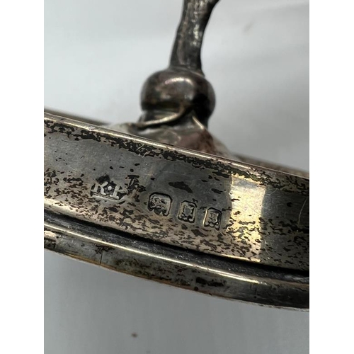 505 - A silver ring tree, with weighted bae. Hallmarked for London 1922 by Robert Pringle & Sons