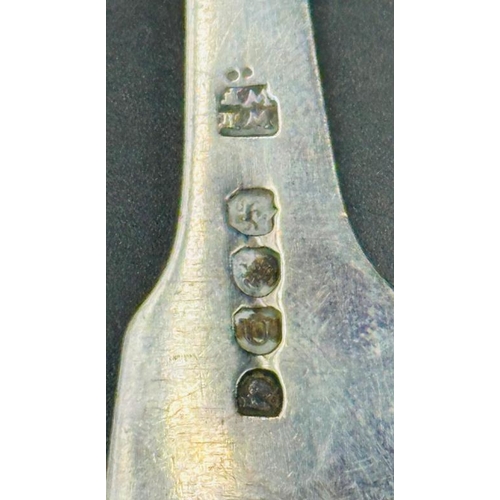 509 - A fiddle and shell silver table spoon, hallmarked for London 1815 by William Eley I & William Fearn,... 