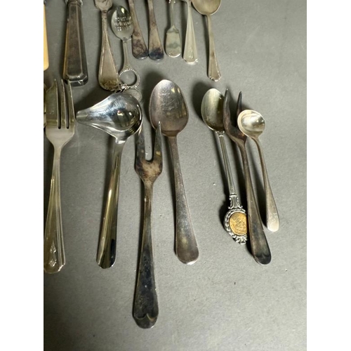 518 - A selection of silver plate and white metal flatware and other items