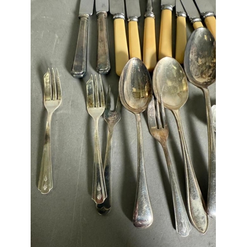 518 - A selection of silver plate and white metal flatware and other items