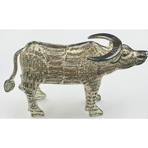 526 - A silver figure of a water buffalo, marked 925.approximately 8cm long.