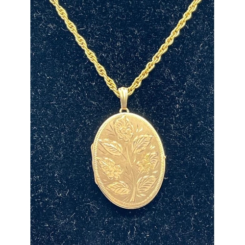 531 - A 9ct gold locket, with floral design and necklace, 37cm drop