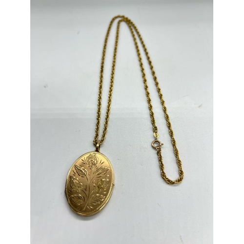 531 - A 9ct gold locket, with floral design and necklace, 37cm drop