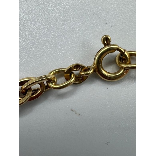 535 - A gold necklace, rope chain, with a drop of 25cm