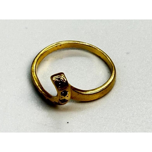 545 - Two 9ct gold rings wishbone and crossover style  (Total approx weight 4.3g)