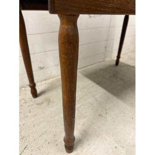 65 - A Pembroke table with drawer one end on turned legs