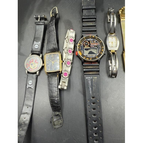 653 - A selection of ladies and gentleman's wristwatches to include Rotary, Fossil and Timex