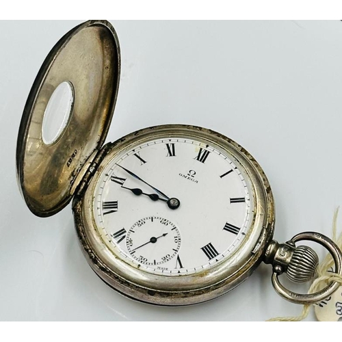 660 - A silver Omega Half hunter pocket watch