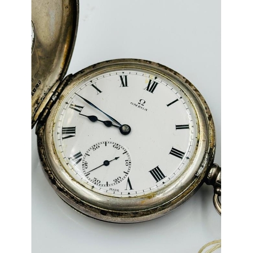 660 - A silver Omega Half hunter pocket watch