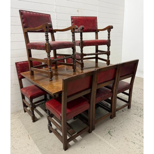 67 - An oak refectory table with peg ends, along with six oak and leather chairs and two carvers (H75cm W... 