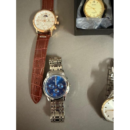 670 - A quantity of gentleman's wristwatches various makers to include Casio, Sekonda and Kintued