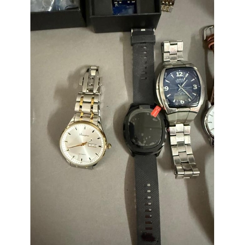 670 - A quantity of gentleman's wristwatches various makers to include Casio, Sekonda and Kintued