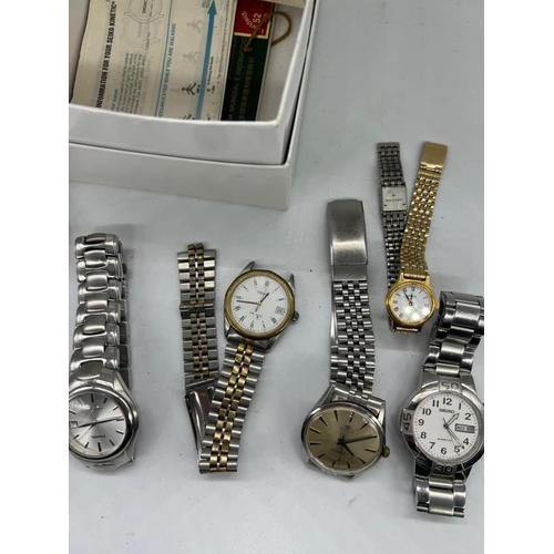 673 - A selection of wristwatches to include Tissot, Seiko, Fossil etc